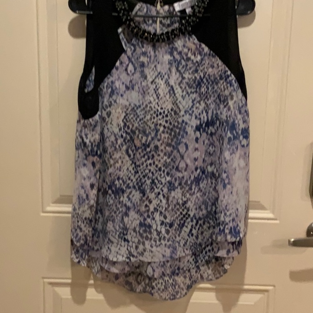 Jennifer Lopez Sleeveless blouse embellished with gems. New- never worn.